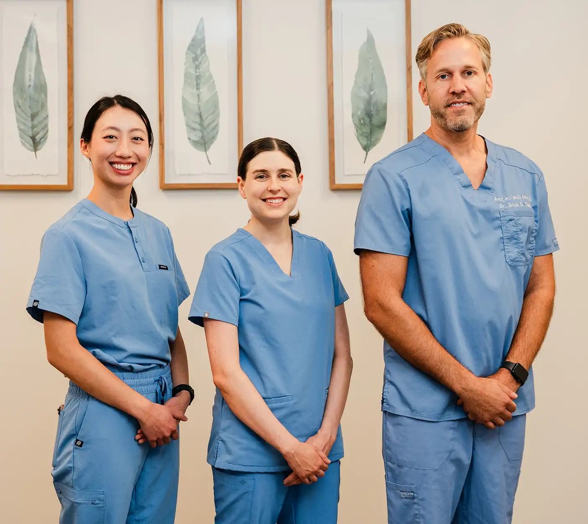 Dr. Priscilla Wong, Dr. Sara Kieschnick and Dr. Brian Tucker of Austin Family Dentist