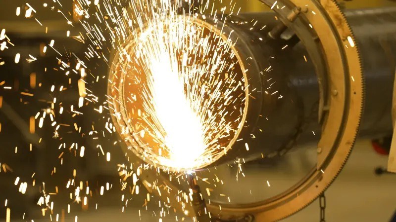 On-site content capture of welding sparks, from the Clique MRKT website