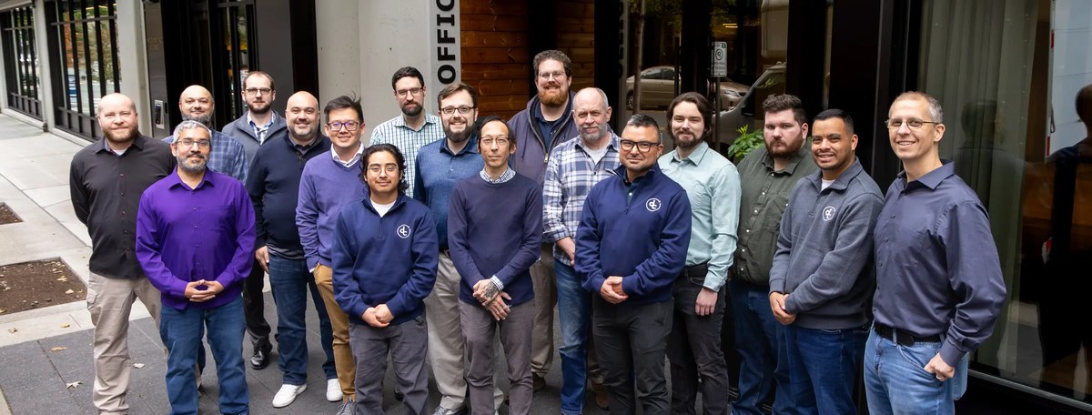 The Dynamic Computing managed IT team outside their downtown Seattle office