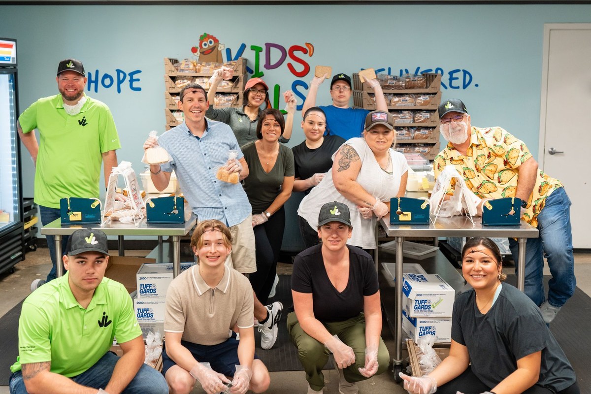 JC CPAs and Advisors team volunteering at a Houston kids' meals program