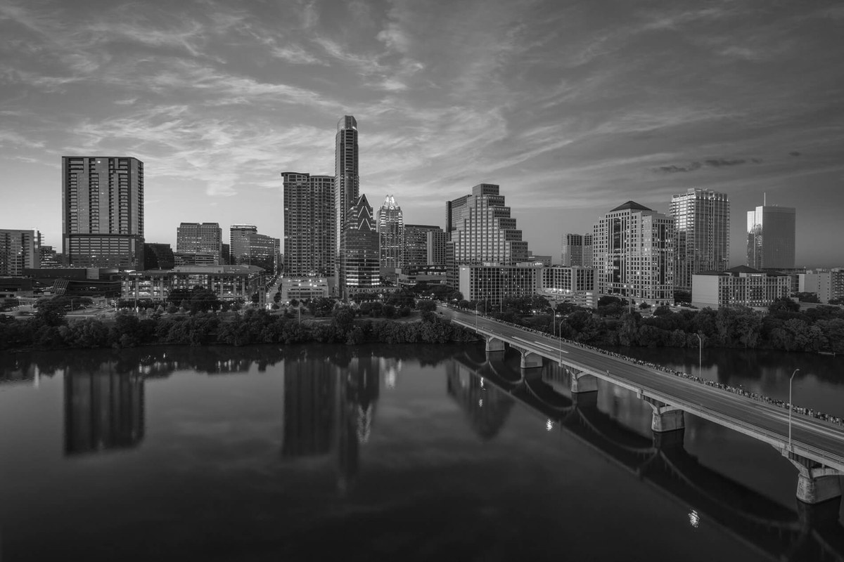 Austin skyline and Lady Bird Lake, home of Kruger Carson commercial real estate lawyers