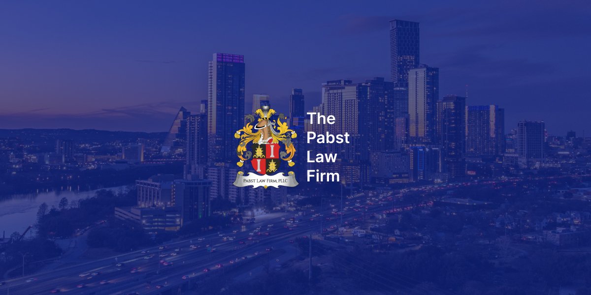 The Pabst Law Firm crest over the Austin skyline