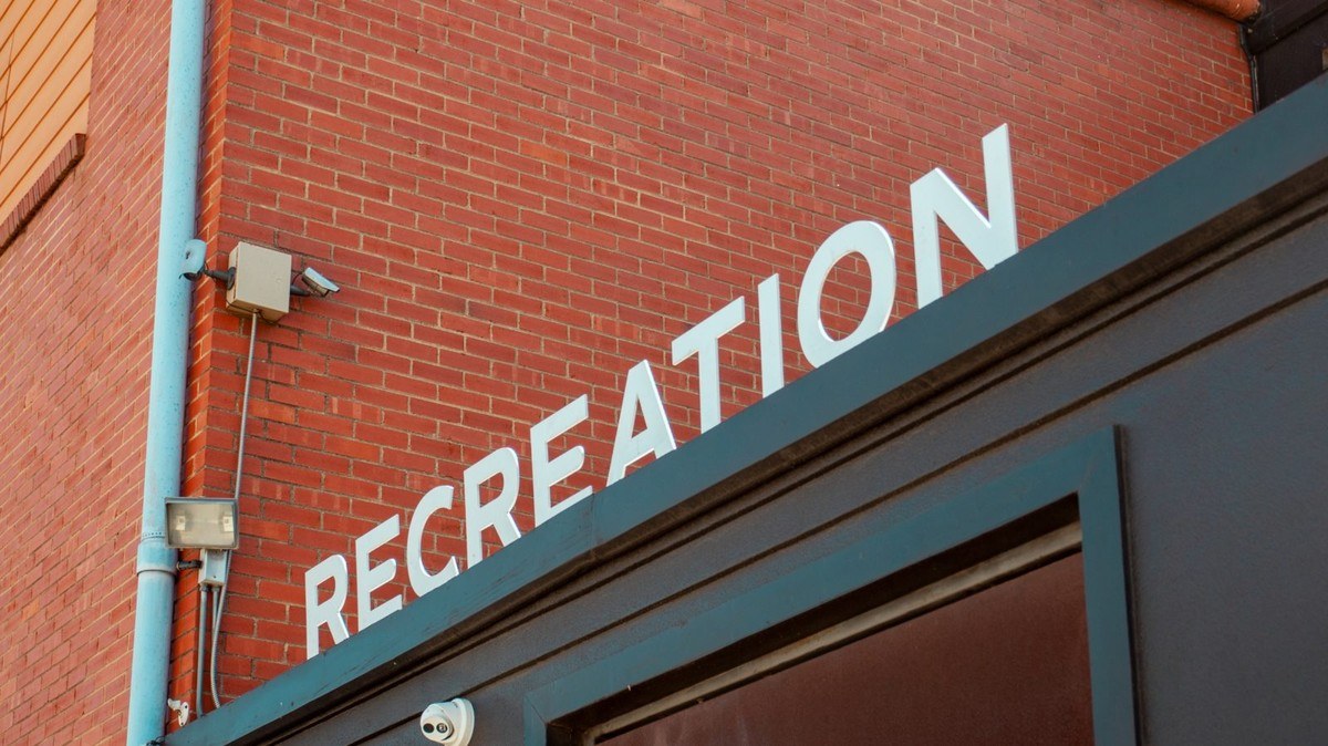 Recreation advertising agency office sign on Commerce Street in Dallas