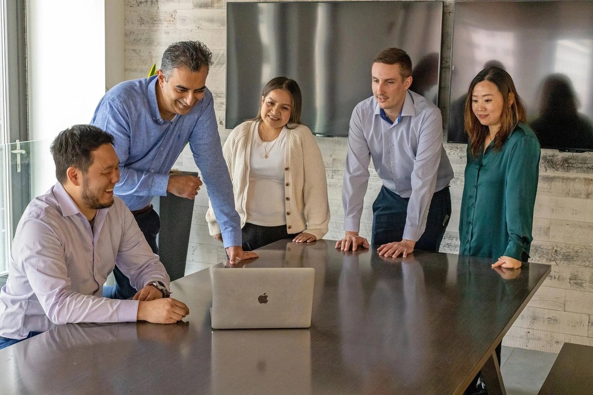 Zhou Agency CPA and tax team meeting at their Chicago office